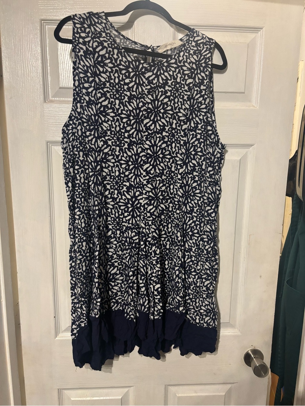 Sleeveless Navy Floral Mini Dress with Ruffled Hem